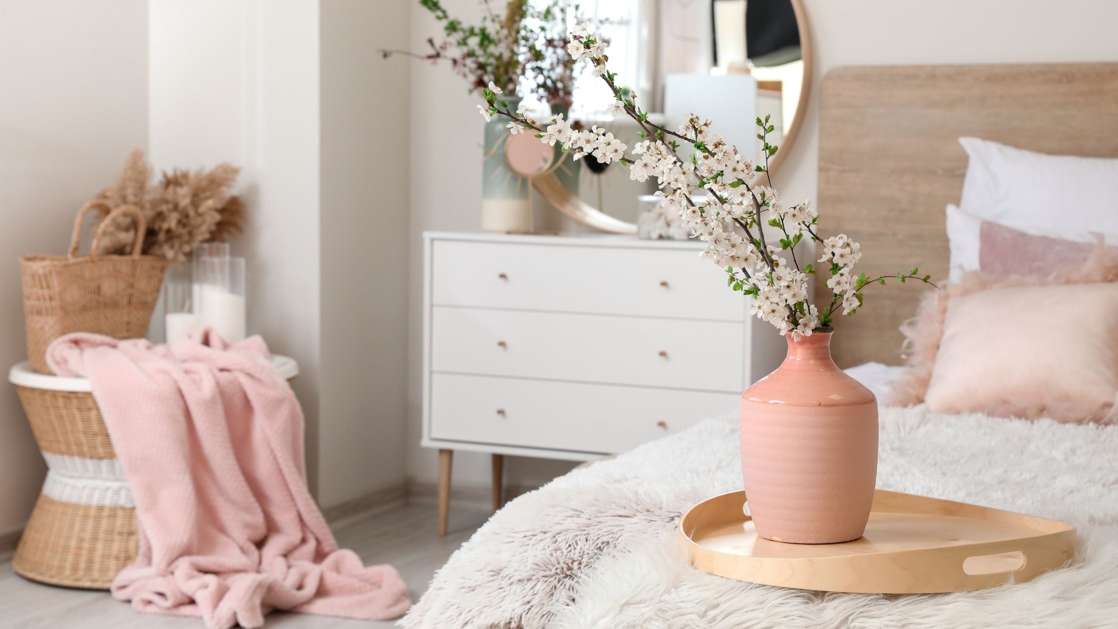 clean bedroom with pink accents